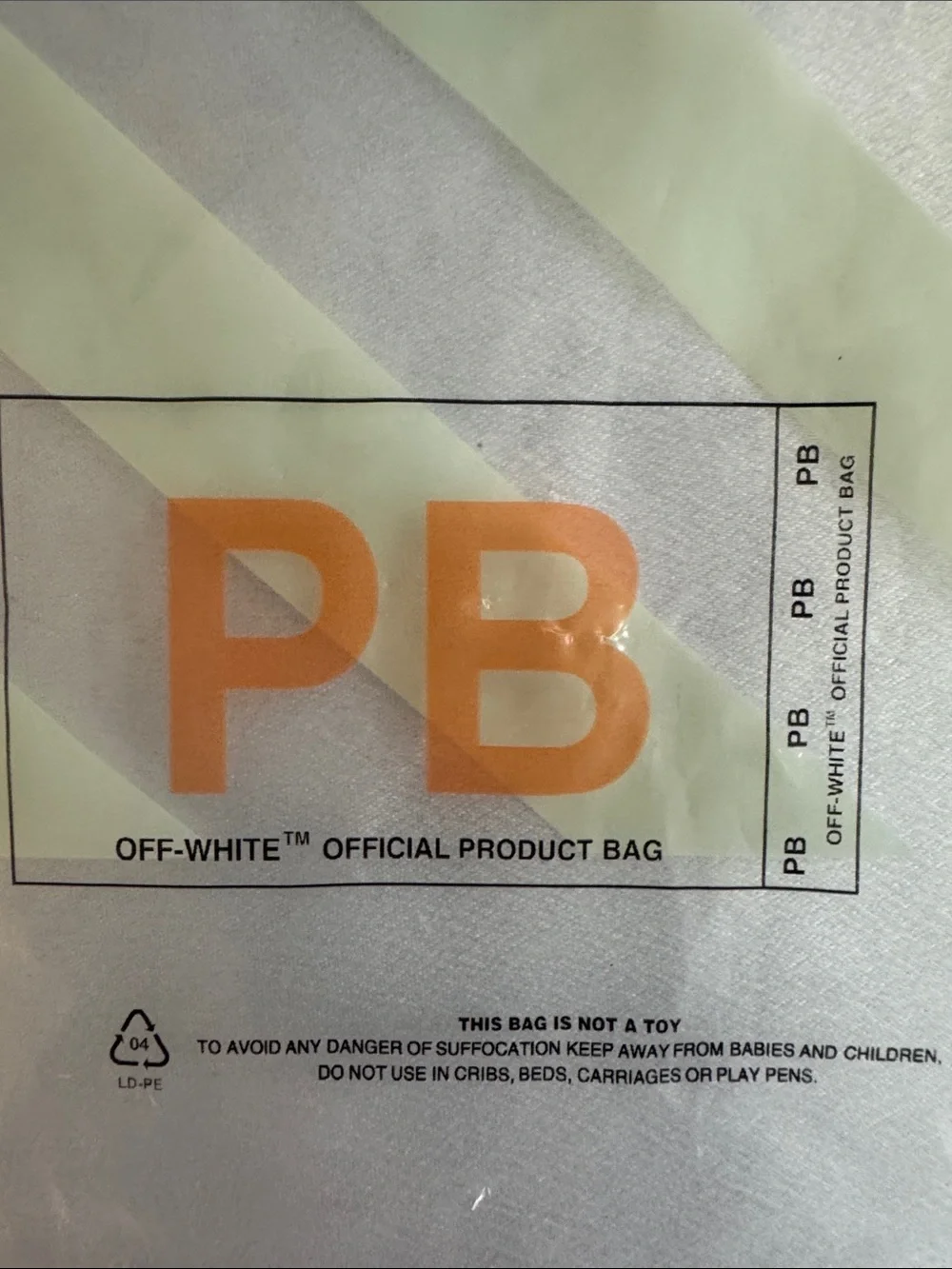 New! Off-White White Nylon Key Strap with Black Diagonal Text and Red Zip Tie